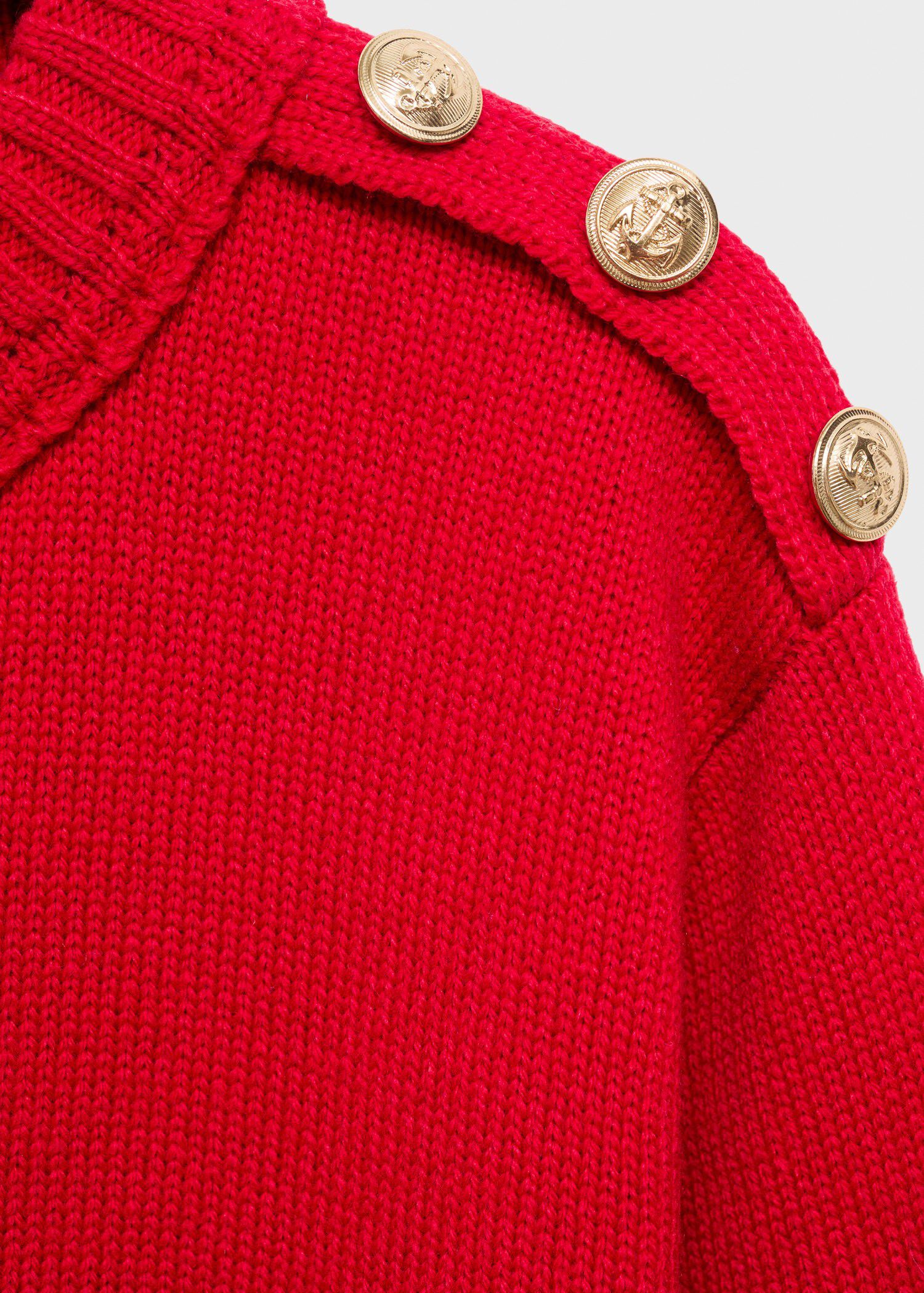 Knitted sweater with jewel buttons