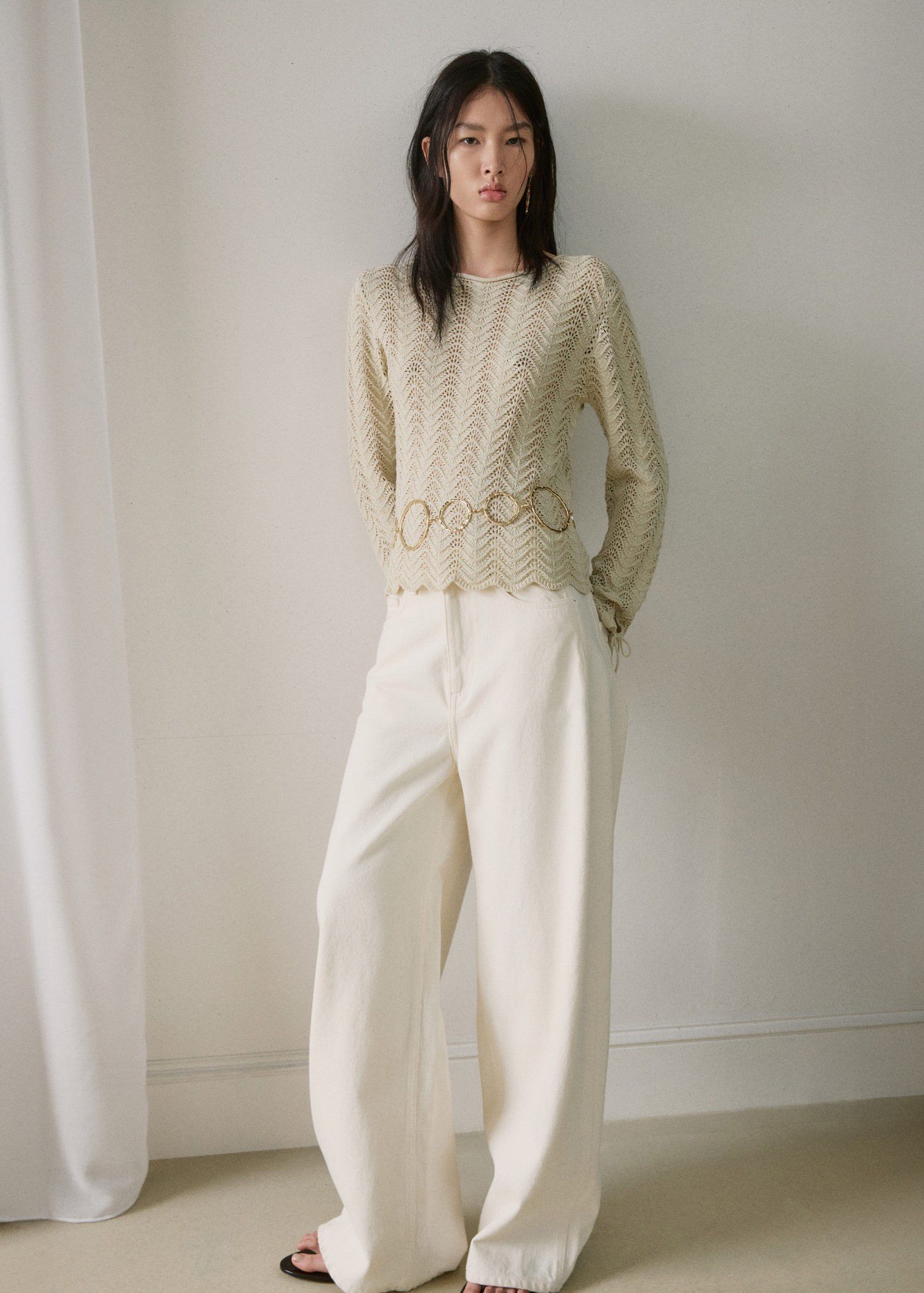 Knitted sweater with openwork detai