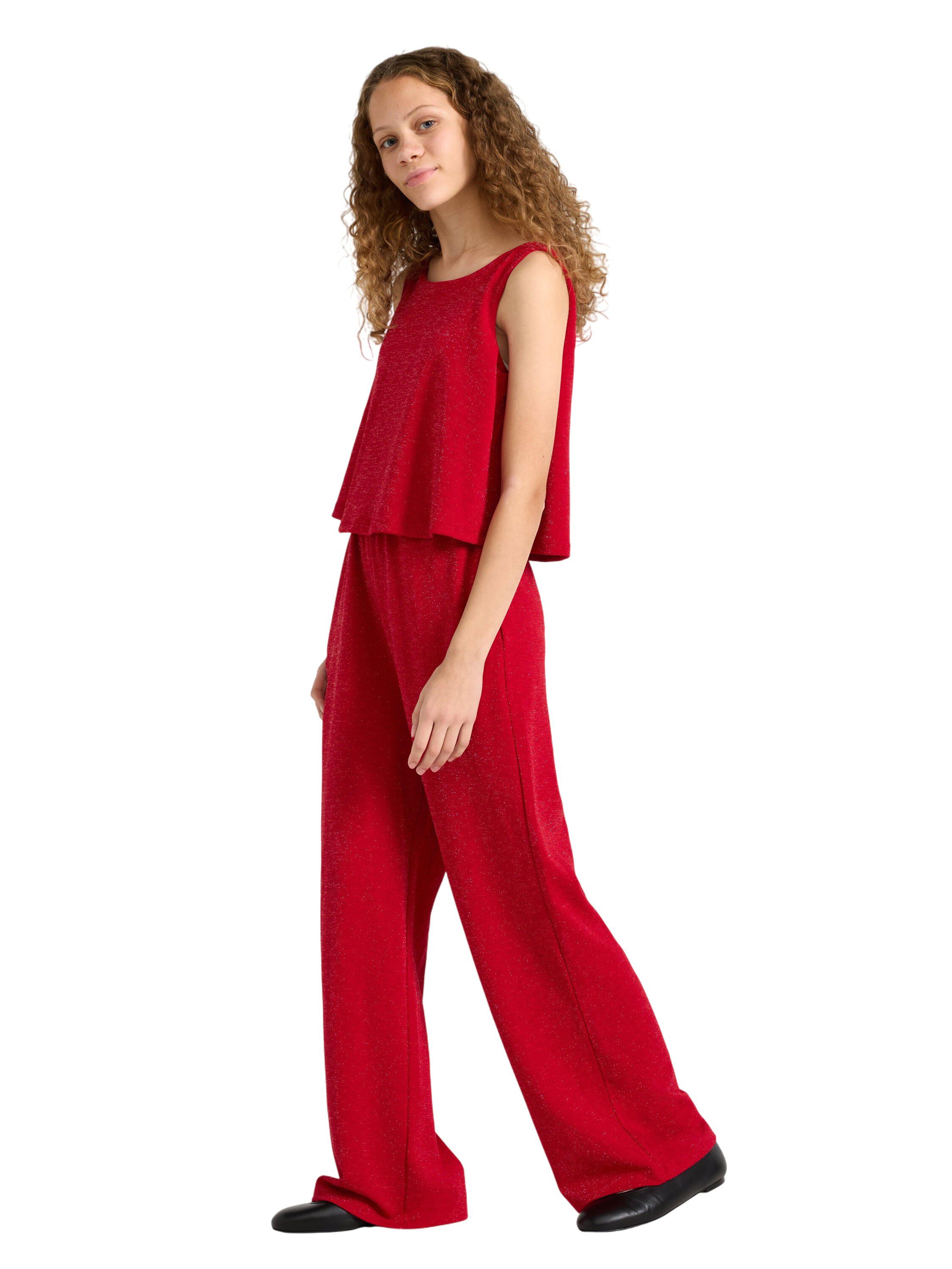 Glitrende, &aelig;rmel&oslash;s buksedragt med b