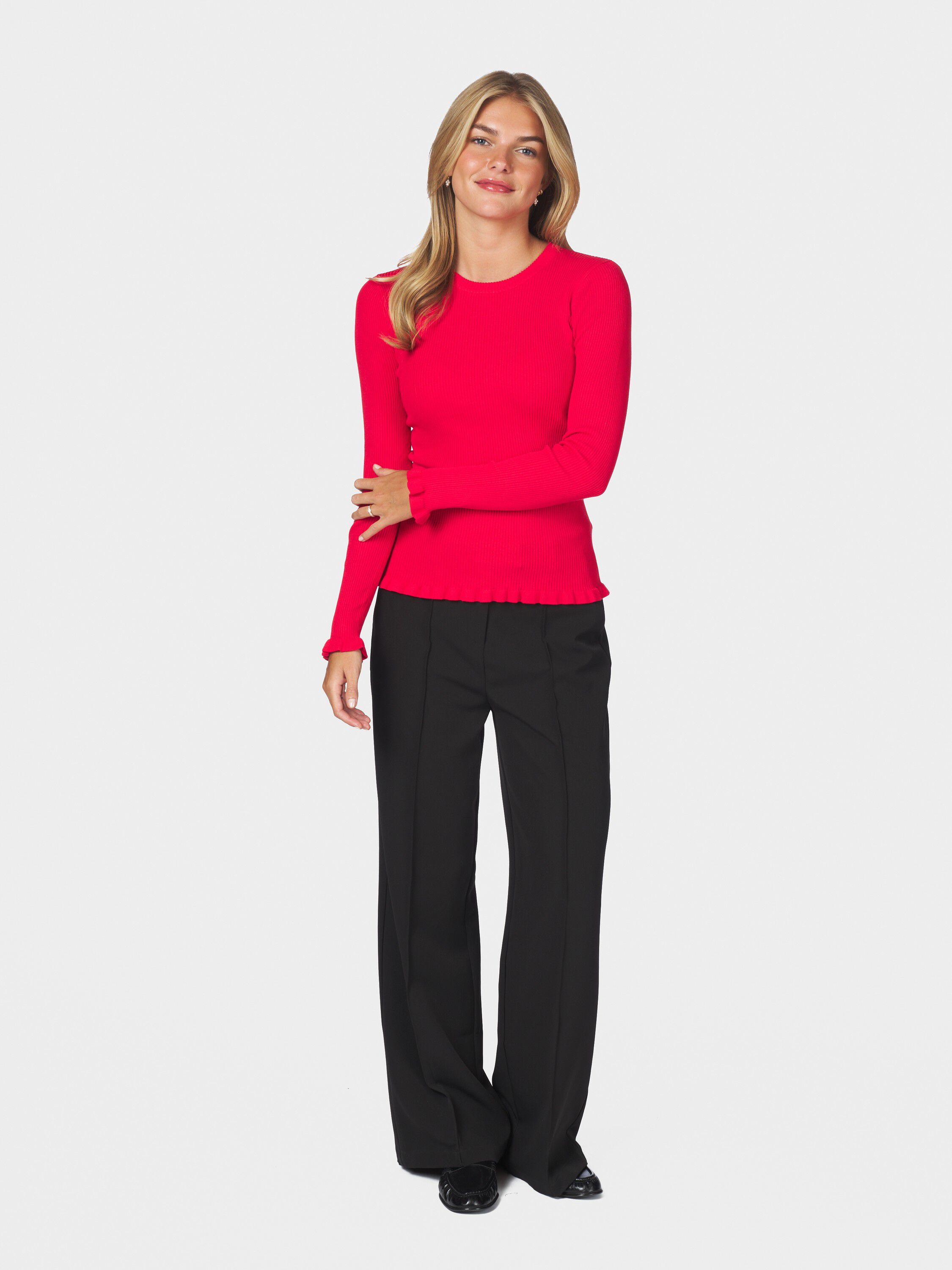 Nelle solid stickad blus