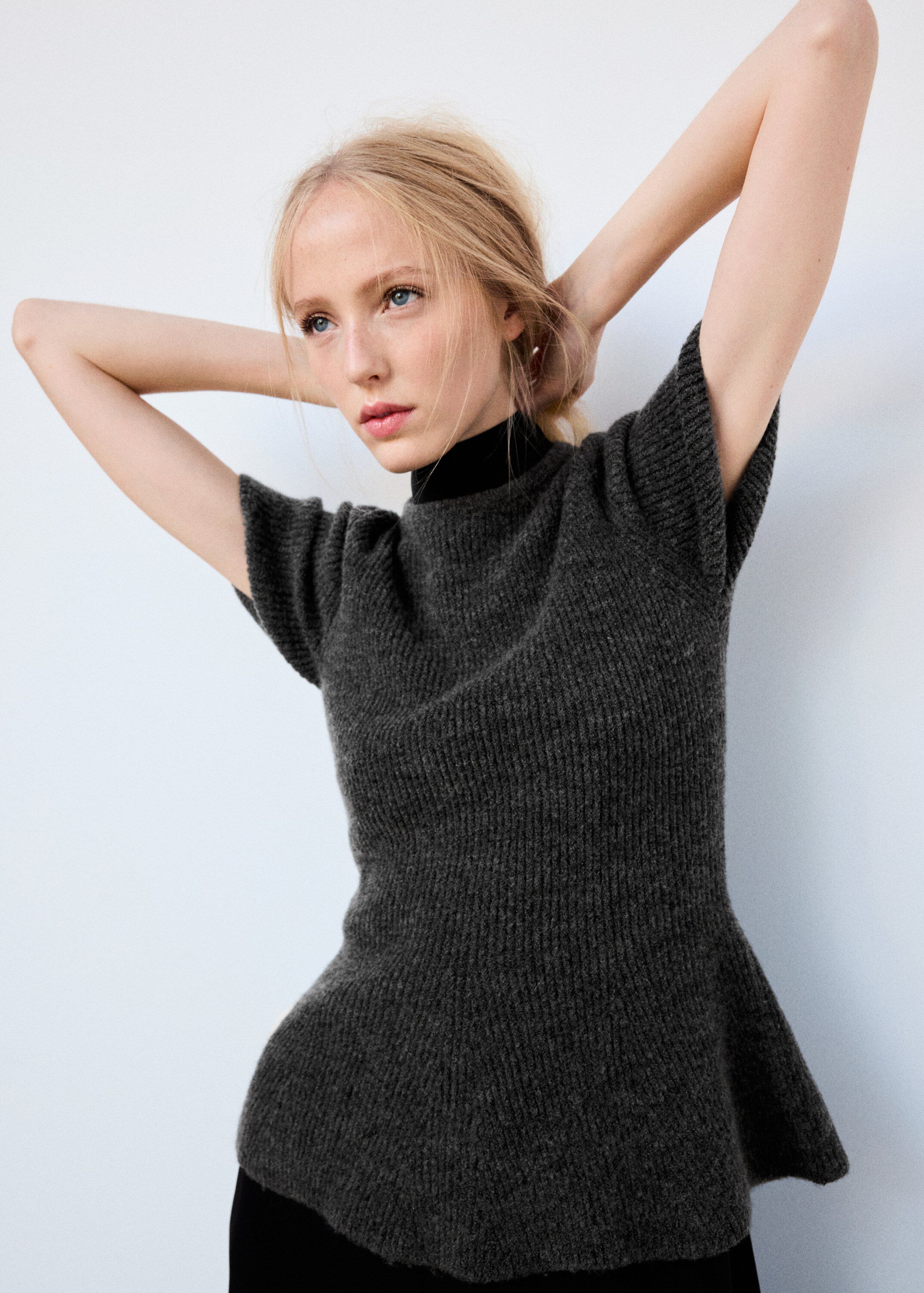 Ribbed peplum sweater