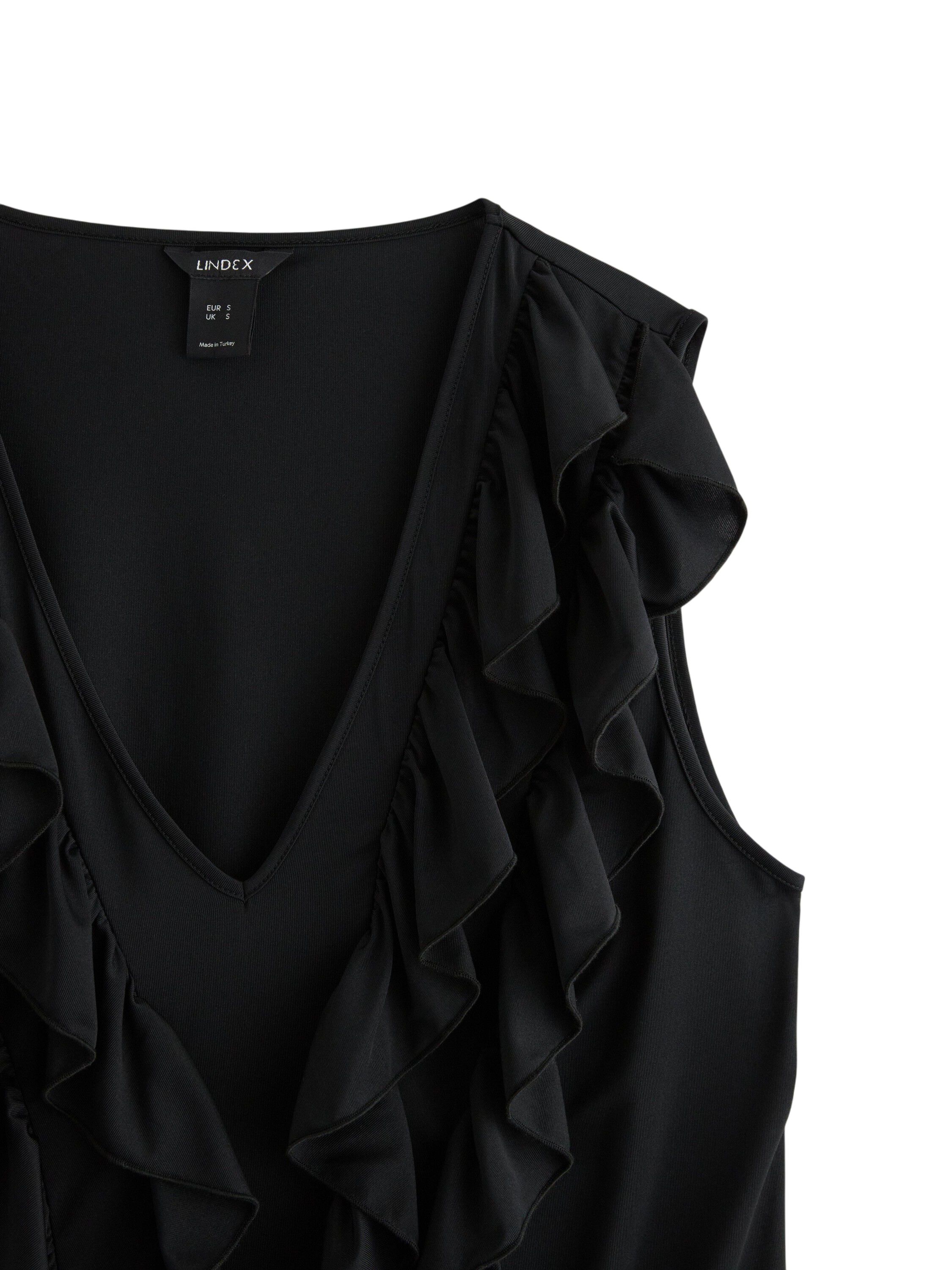 �rml&ouml;s topp i mjuk trik&aring; med vol