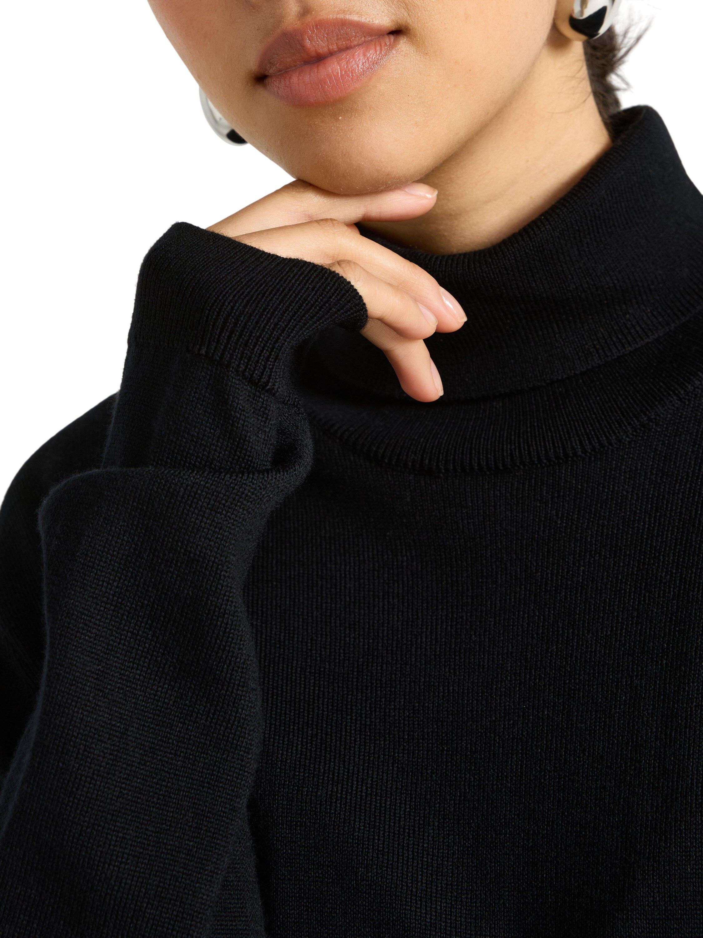 Bl&oslash;d tr&oslash;je i merinould med rullekra