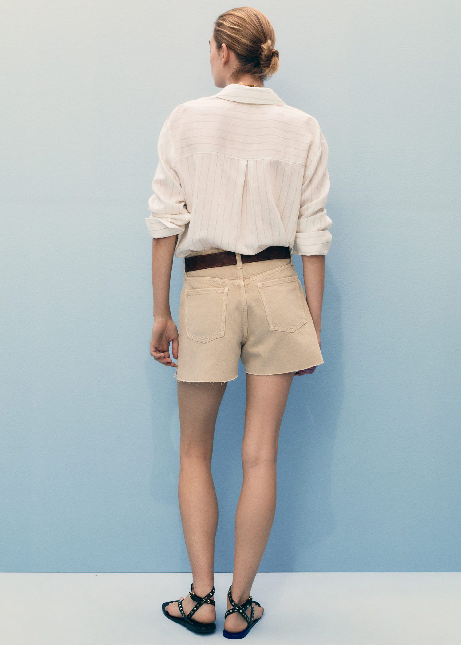 Denim shorts with frayed hem
