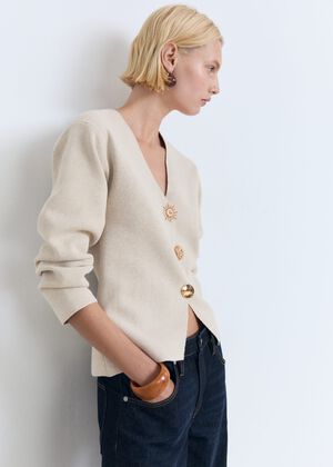 Knitted jacket with jewel buttons