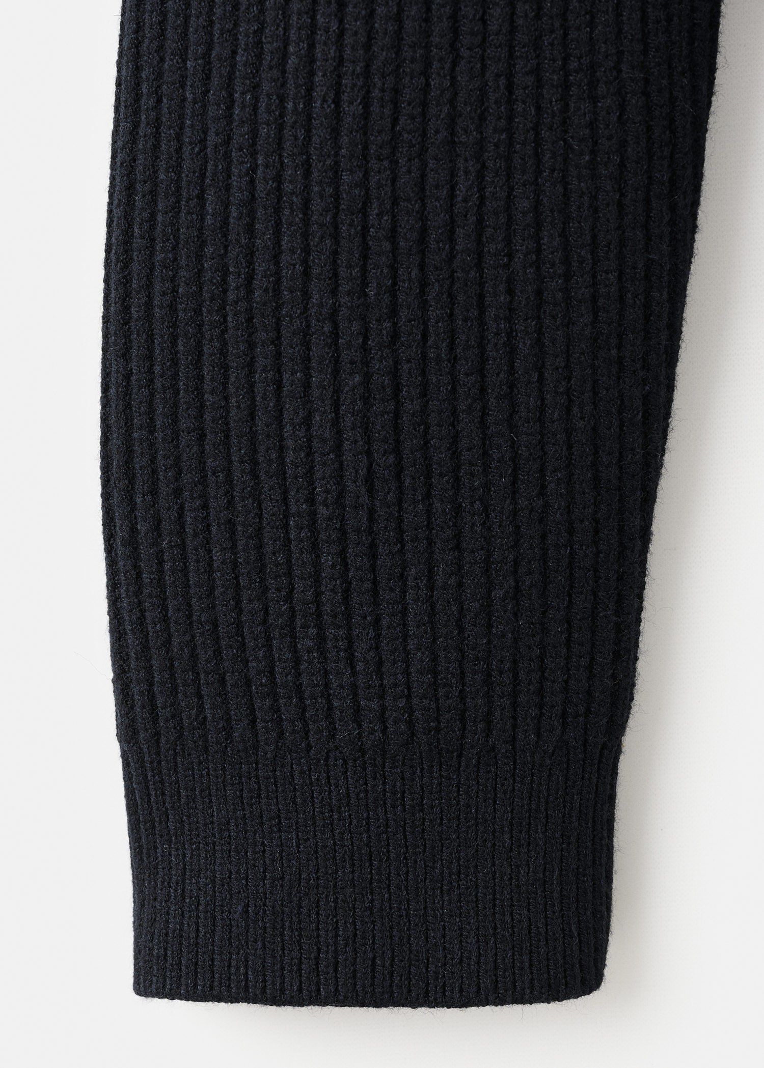 Ribbed polo-neck sweater with butto