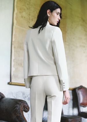 Jacket with jewel-button strip coll