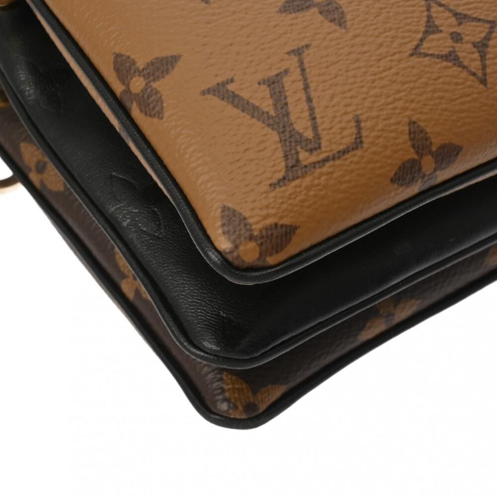 Louis Vuitton Clutch