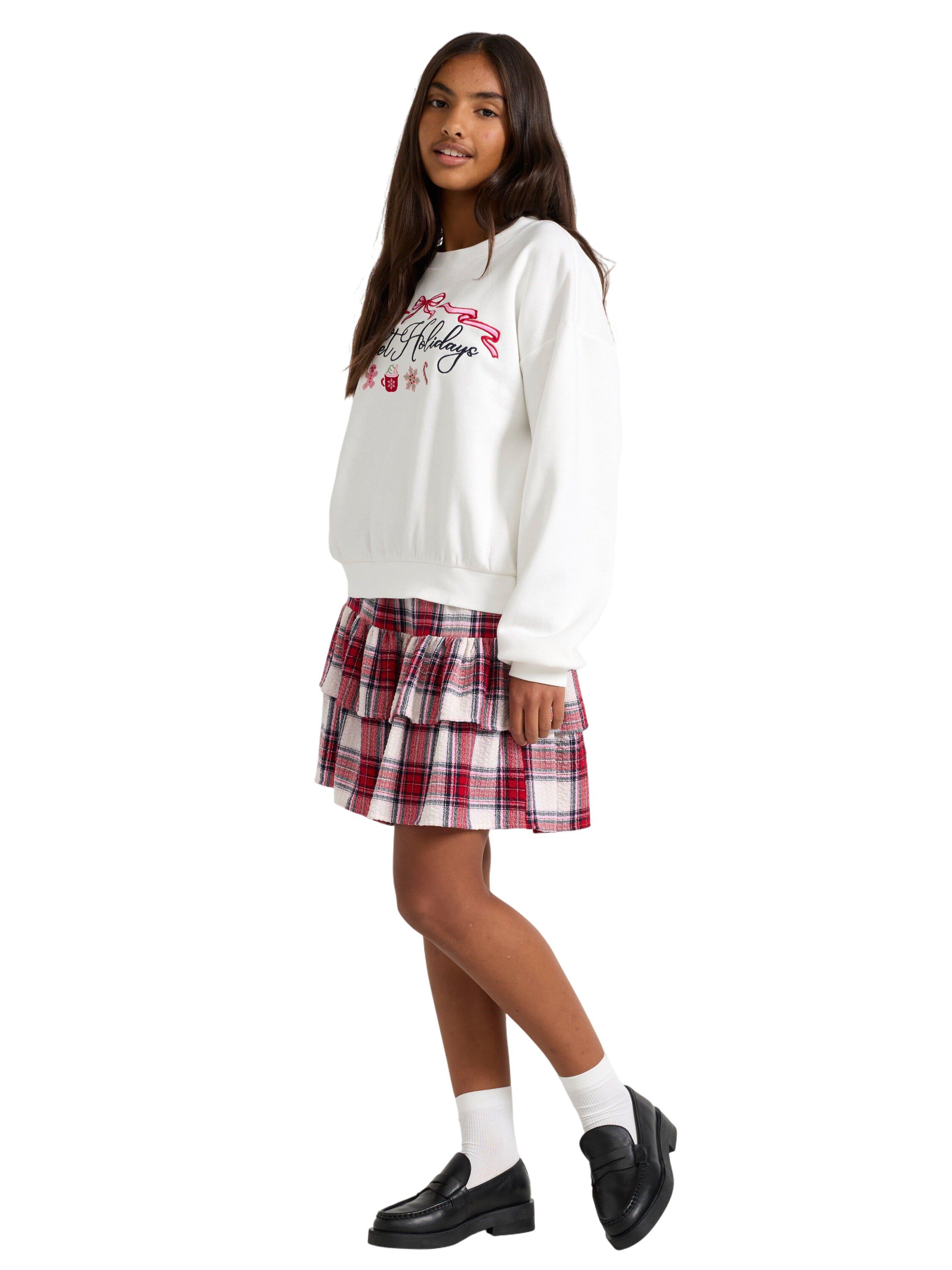 Vevd skj&oslash;rt med volanger og elastis