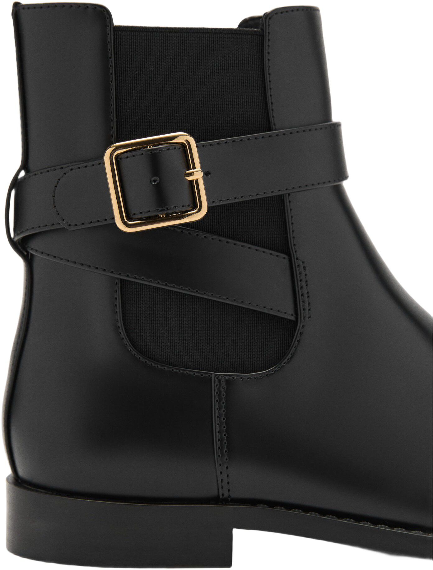 Ankle boots with elastic panel and