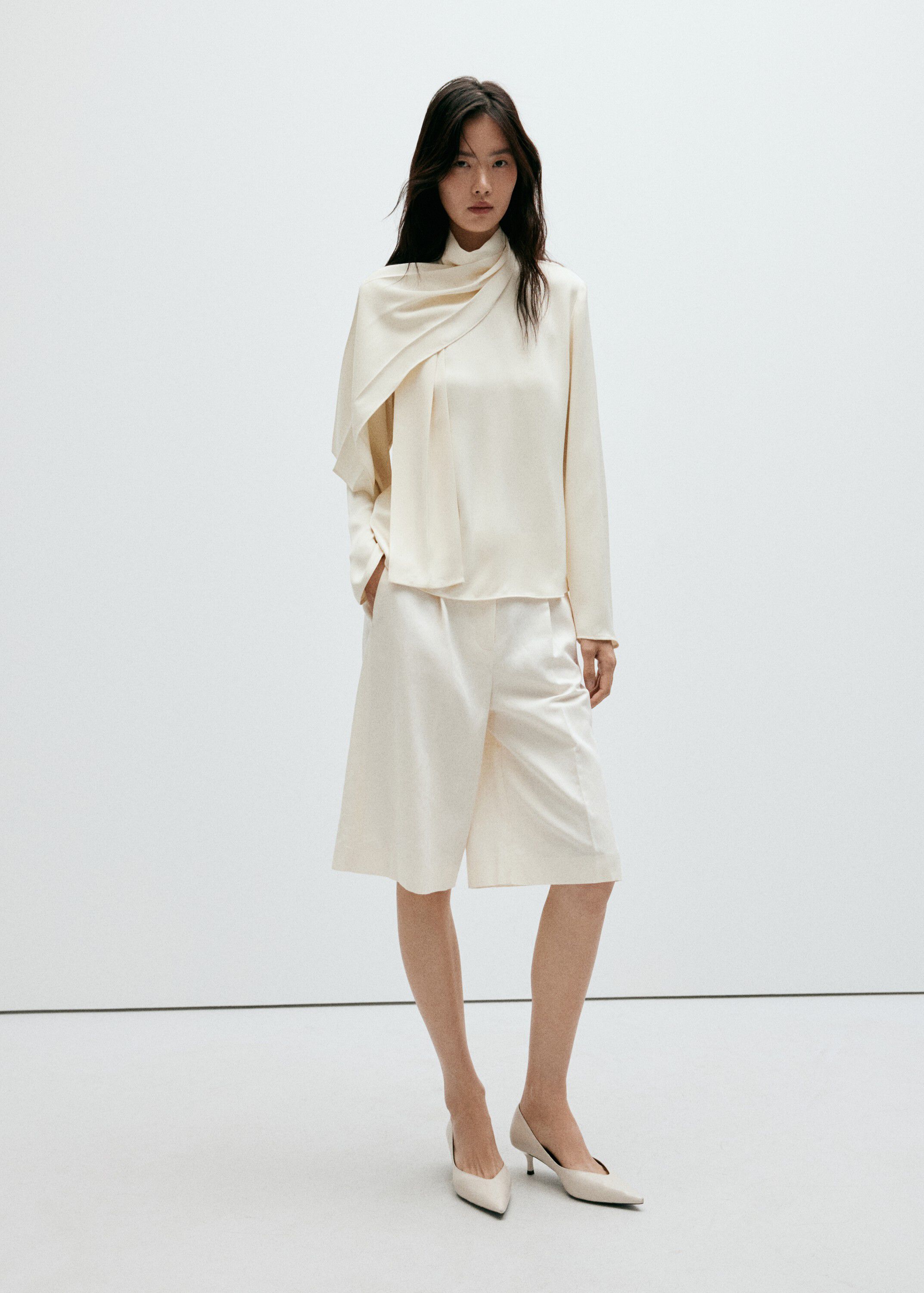 High-neck blouse with scarf detail