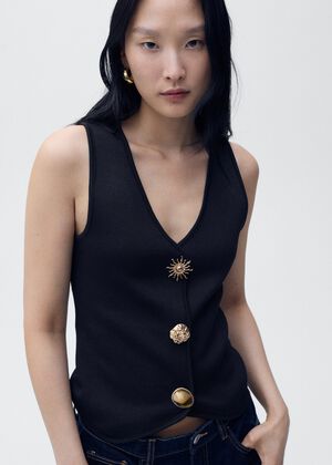 Knitted waistcoat with jewel button