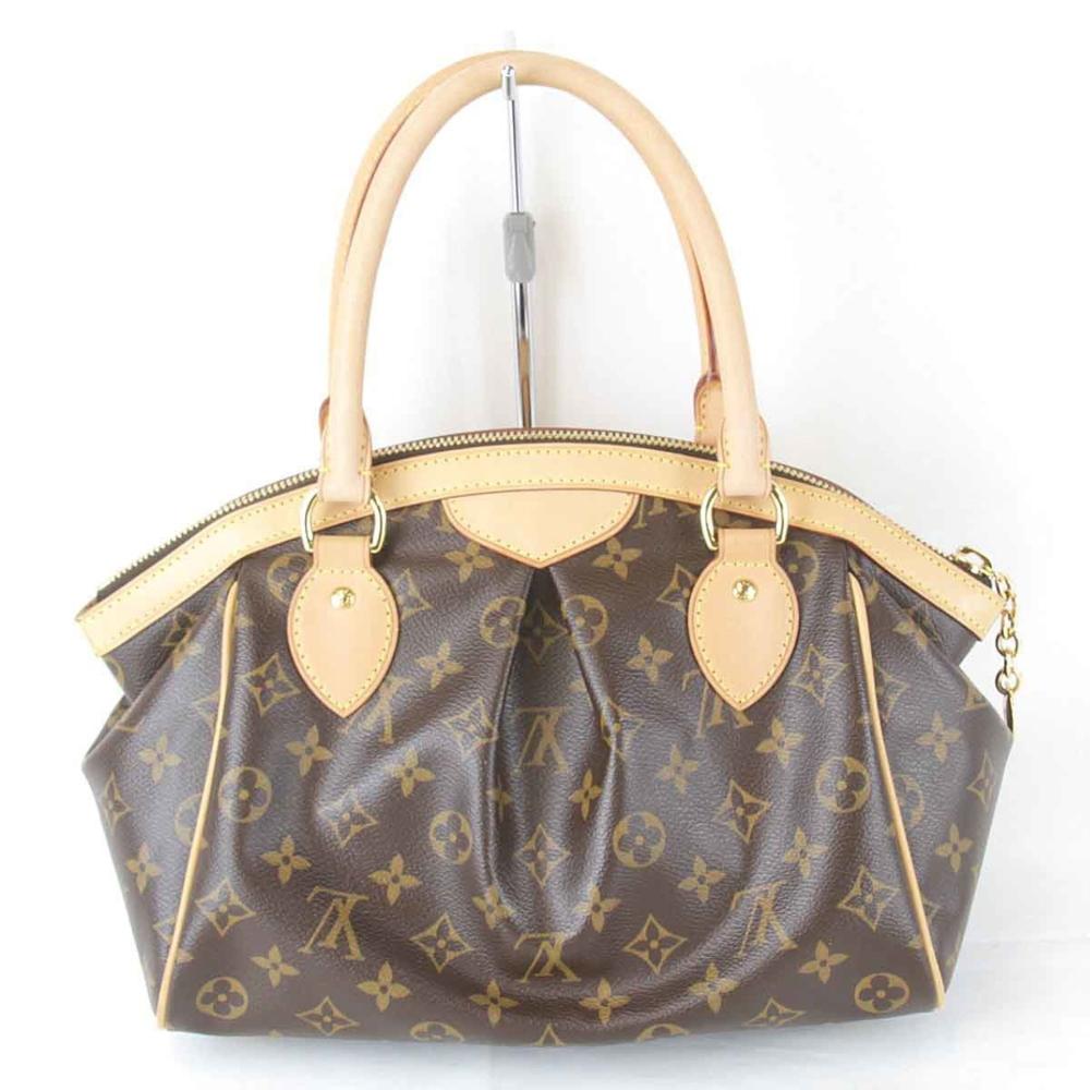 Louis Vuitton Vintage Lockit Stl. - Handväskor Från Magasin